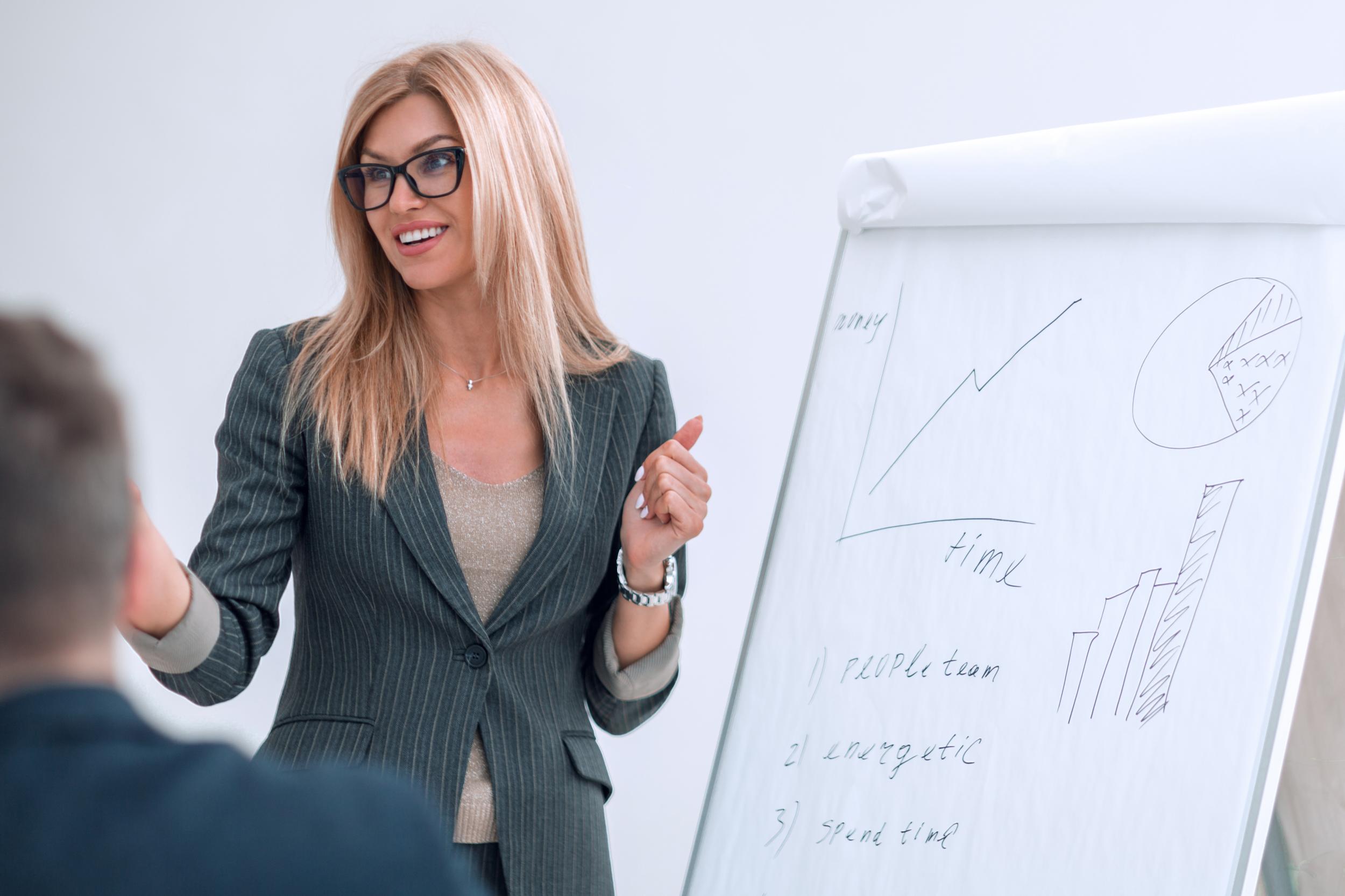 Shop owner leaning on counter